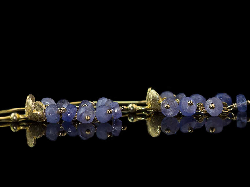 A Bunch Of Tanzanites | dangly earrings in Gold vermeil with flower (made to order) A Bunch Of Tanzanites | dangly earrings in Gold vermeil with flower (made to order)